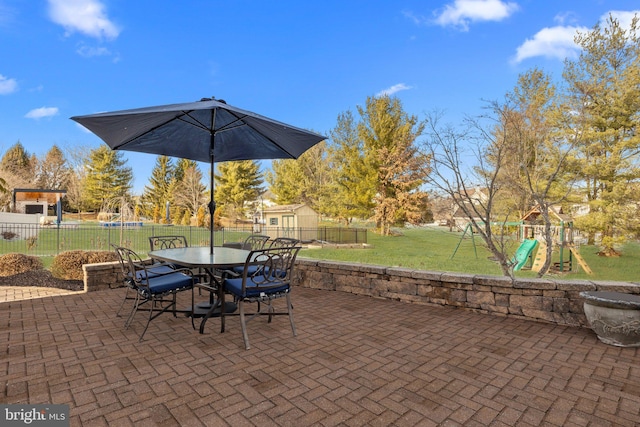 view of patio with a playground