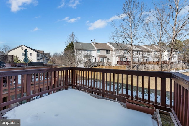 view of snow covered deck