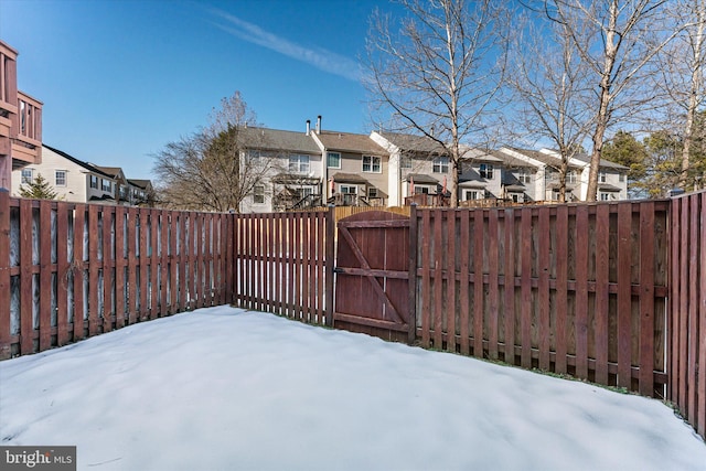 view of yard covered in snow