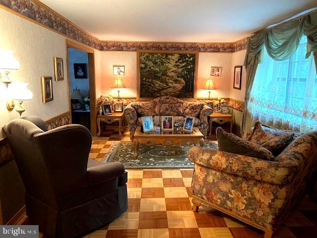 living room featuring light parquet flooring