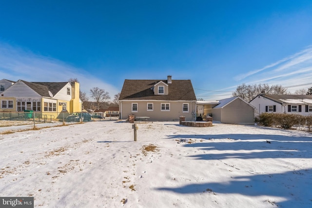 view of snow covered house