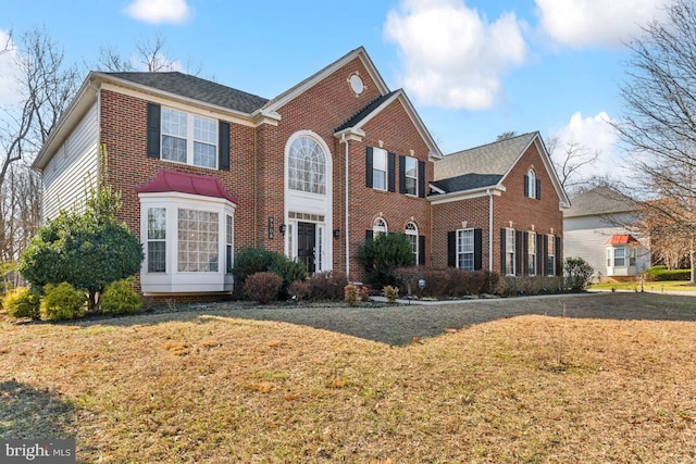 view of front facade featuring a front yard