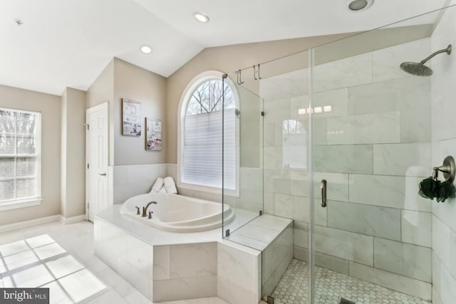 bathroom with vaulted ceiling and separate shower and tub