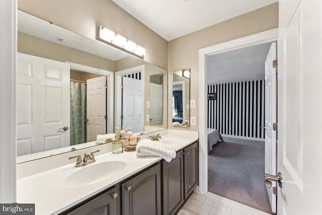 bathroom with vanity and tile patterned floors