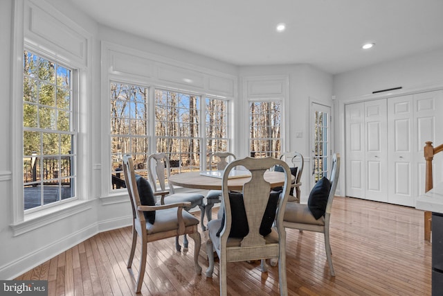 dining space featuring light hardwood / wood-style floors