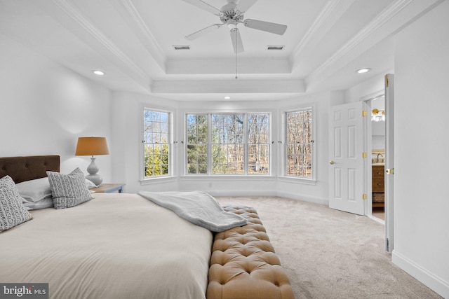 bedroom with crown molding, a raised ceiling, ceiling fan, and carpet flooring