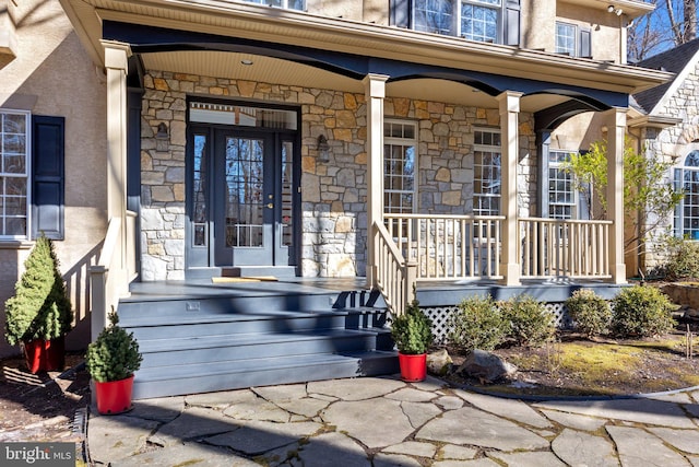 entrance to property with covered porch