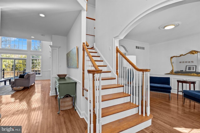 stairway featuring hardwood / wood-style floors