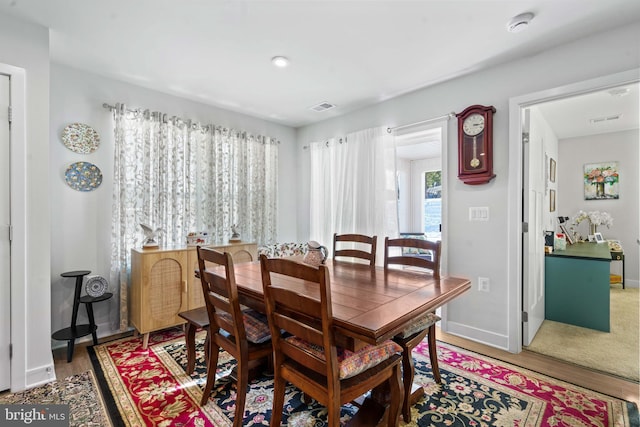 dining room featuring hardwood / wood-style floors