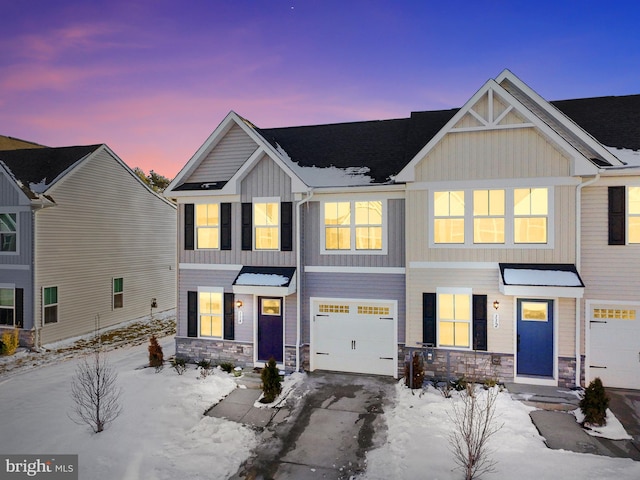 view of front of property with a garage