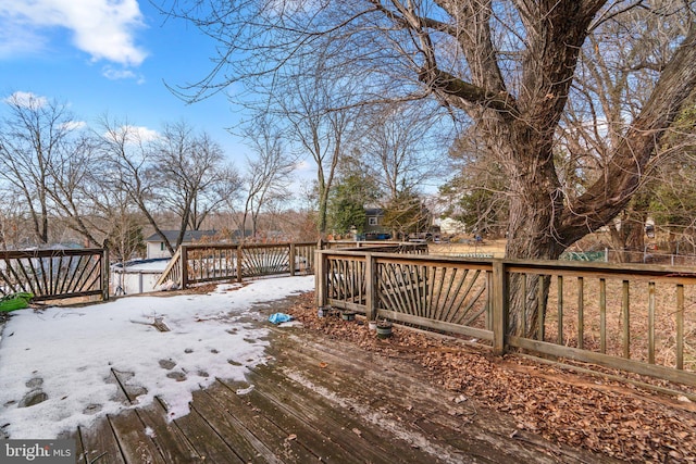 view of snow covered deck