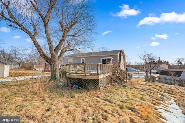 rear view of property with a deck