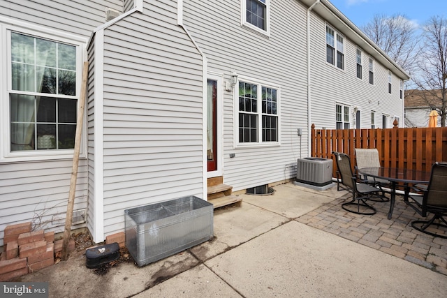 view of patio with central AC unit