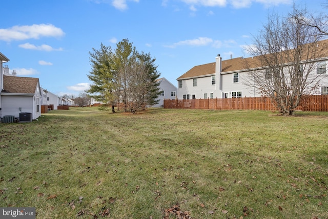 view of yard with central AC