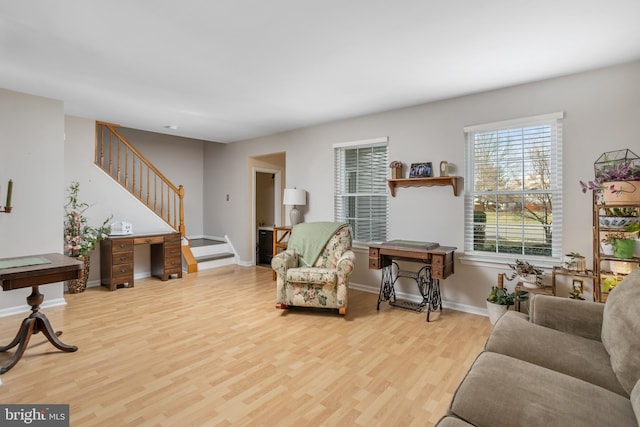 living room with light hardwood / wood-style floors