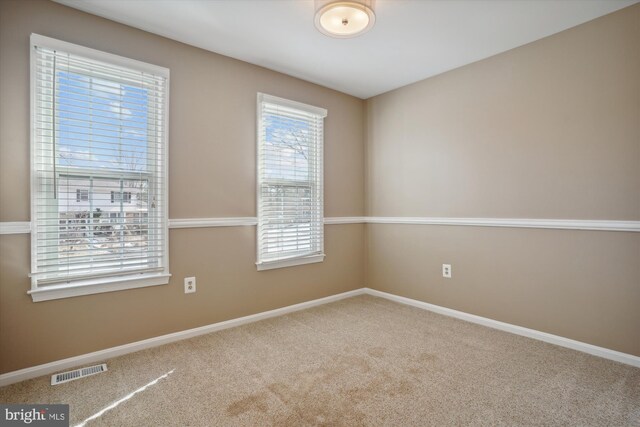 view of carpeted spare room