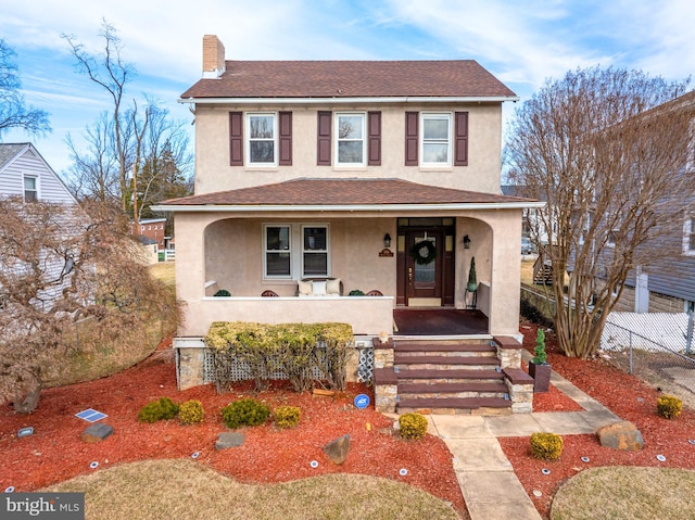 view of front property featuring covered porch