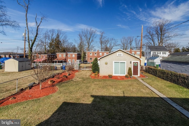 view of yard with a storage shed