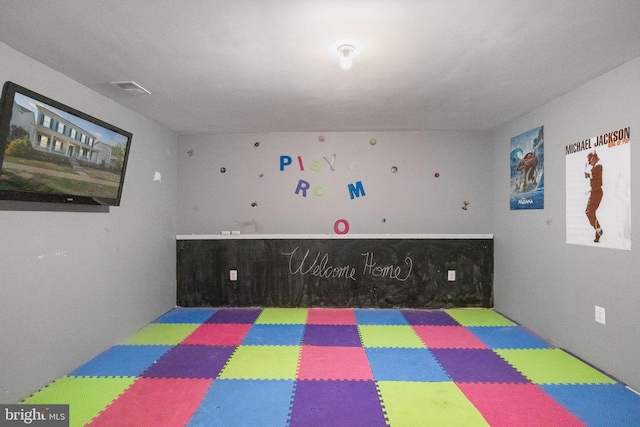 recreation room with visible vents
