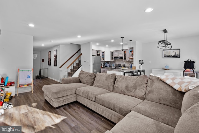 living room with dark wood-type flooring