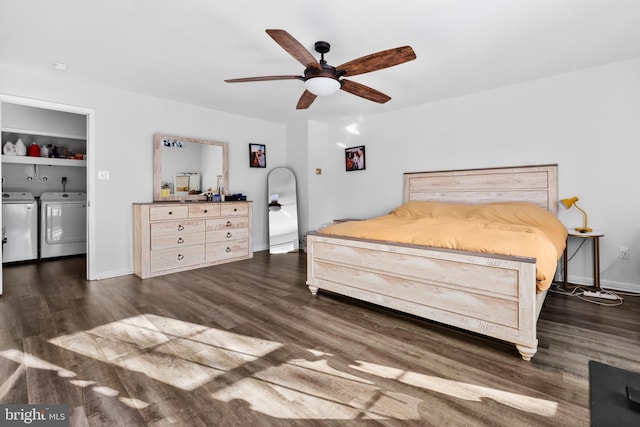 bedroom with ceiling fan, dark hardwood / wood-style floors, and separate washer and dryer