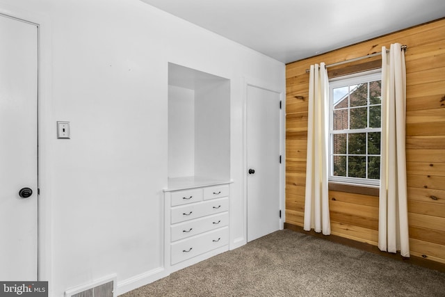 unfurnished bedroom featuring carpet floors