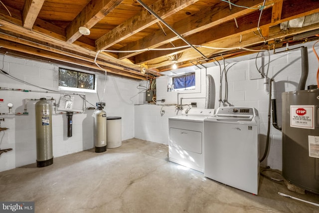 basement with washer and dryer and electric water heater