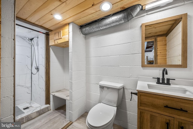 bathroom with vanity, toilet, and walk in shower