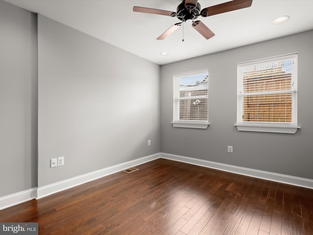 2437 Fleet St, Baltimore, MD 21224 - unfurnished room with baseboards, dark wood-style flooring, a ceiling fan, and recessed lighting