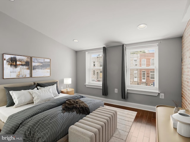 2437 Fleet St, Baltimore, MD 21224 - bedroom featuring hardwood / wood-style floors, baseboards, recessed lighting, and lofted ceiling