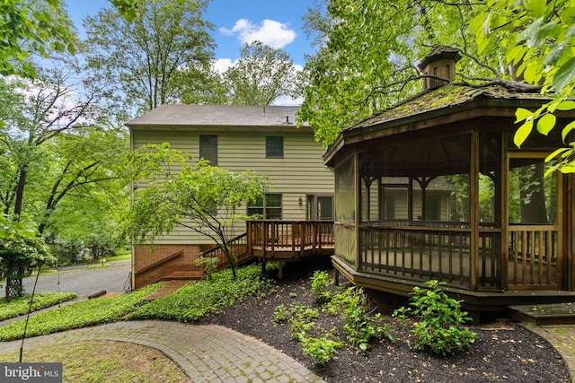 7210 James I Harris Memorial Dr, Frederick, MD 21702 - rear view of house with a wooden deck