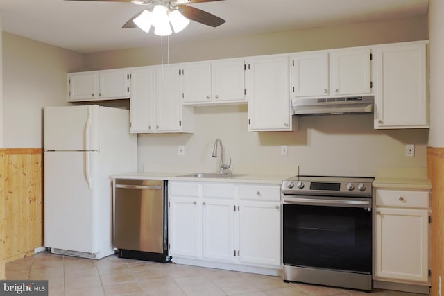 kitchen featuring sink, white cabinets, and appliances with stainless steel finishes