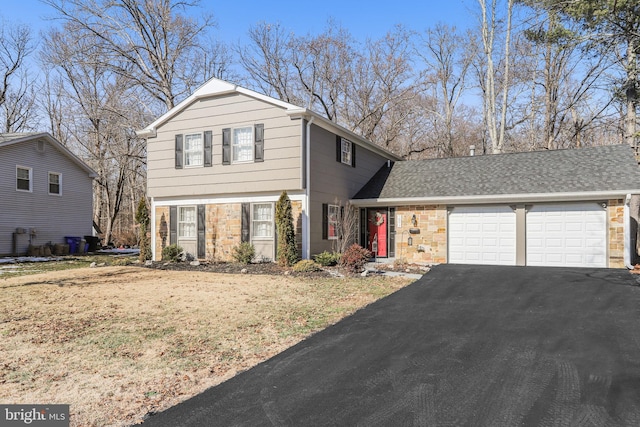 front of property with a garage