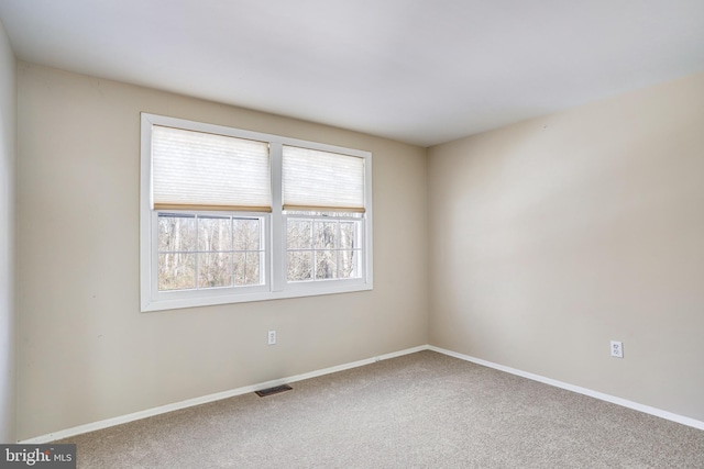 view of carpeted spare room