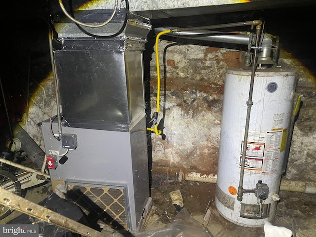 utilities featuring heating unit and gas water heater