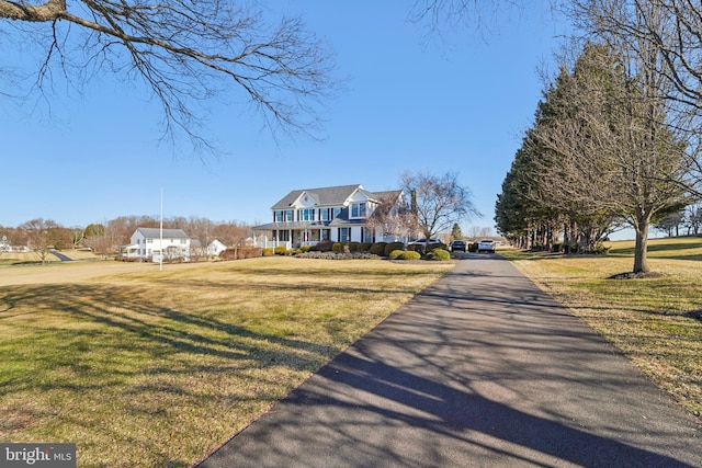 view of front of home featuring a front lawn