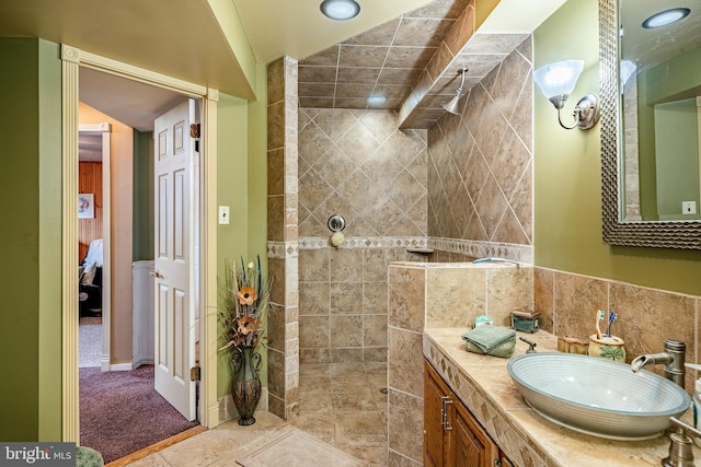 full bath featuring vanity and walk in shower