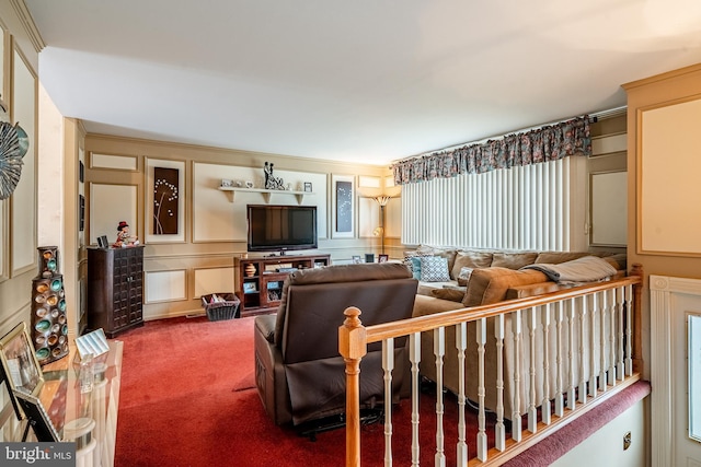carpeted living room with a decorative wall