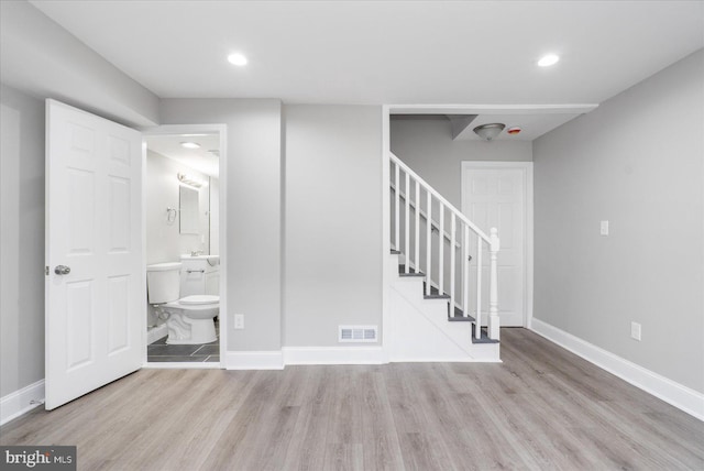 interior space with hardwood / wood-style floors