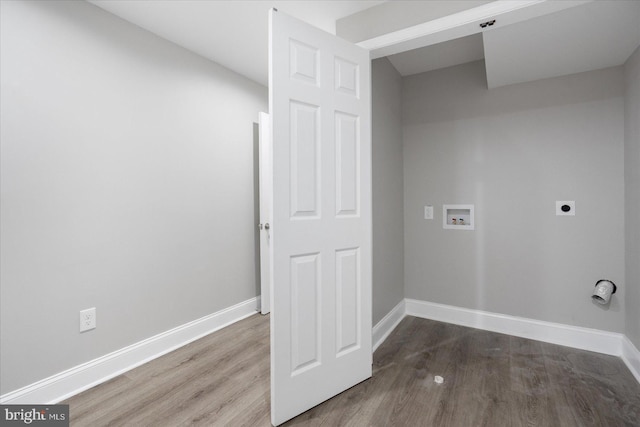 laundry area with wood-type flooring, hookup for an electric dryer, and hookup for a washing machine