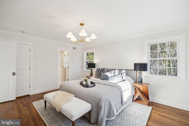 bedroom with ornamental molding, dark hardwood / wood-style floors, and an inviting chandelier