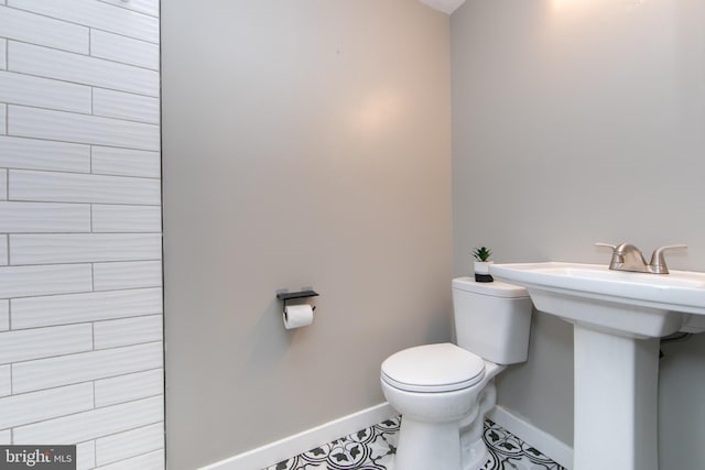 bathroom featuring toilet