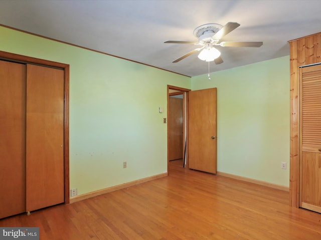 unfurnished bedroom featuring light hardwood / wood-style flooring and ceiling fan