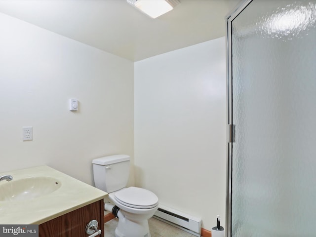 bathroom with baseboard heating, vanity, toilet, and walk in shower