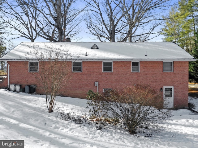 view of snow covered property