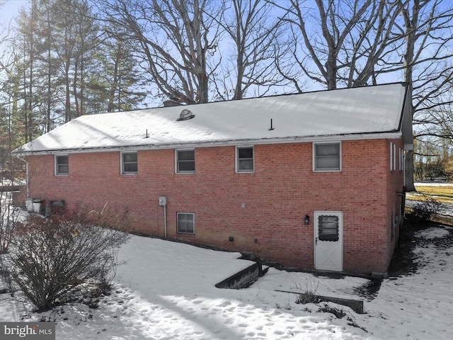 view of snow covered property