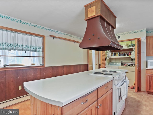 kitchen featuring island exhaust hood, baseboard heating, a kitchen island, white appliances, and light parquet floors