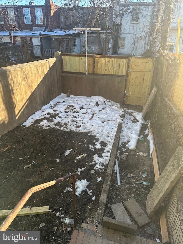 view of yard covered in snow