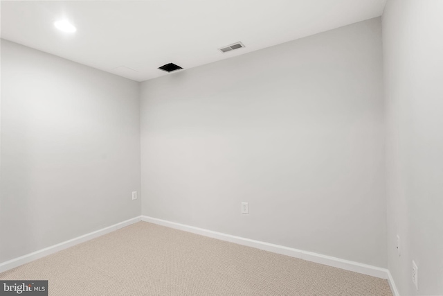 empty room with carpet flooring