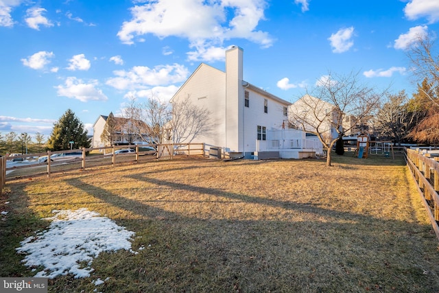 view of property exterior featuring a yard